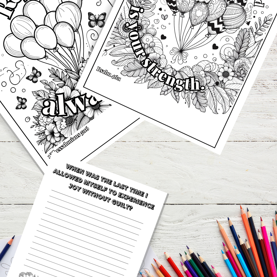 Balloon color pages and journal prompt on wooden table with colored pencils