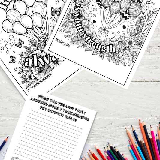 Balloon color pages and journal prompt on wooden table with colored pencils