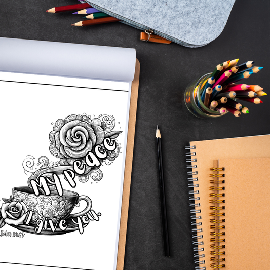 Coloring book with black and white design, pencils, and notebook on a dark surface